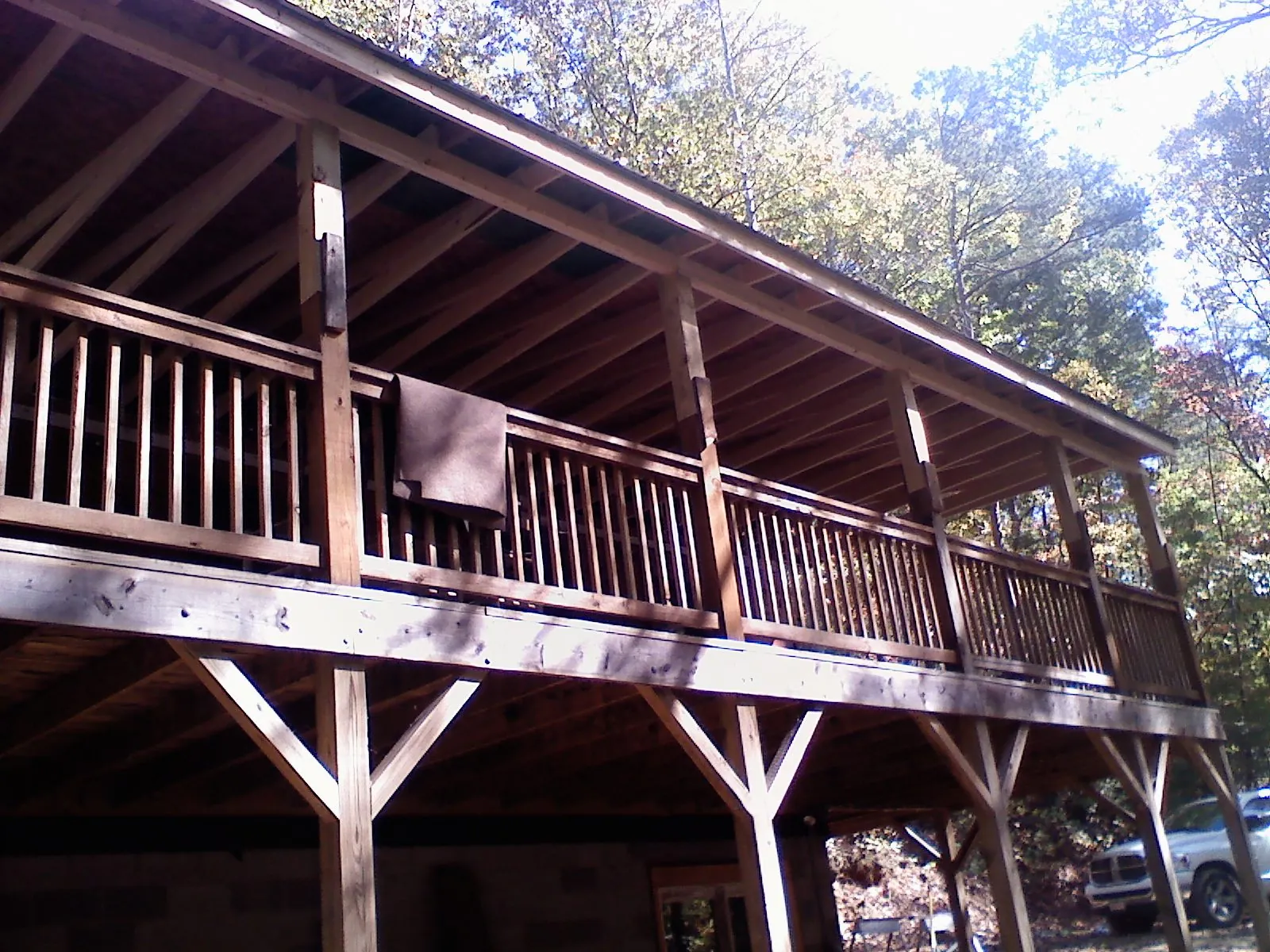 Timber framing under a new elevated porch and deck — Roof Leak Repair in Longwood by Roofing Brothers
